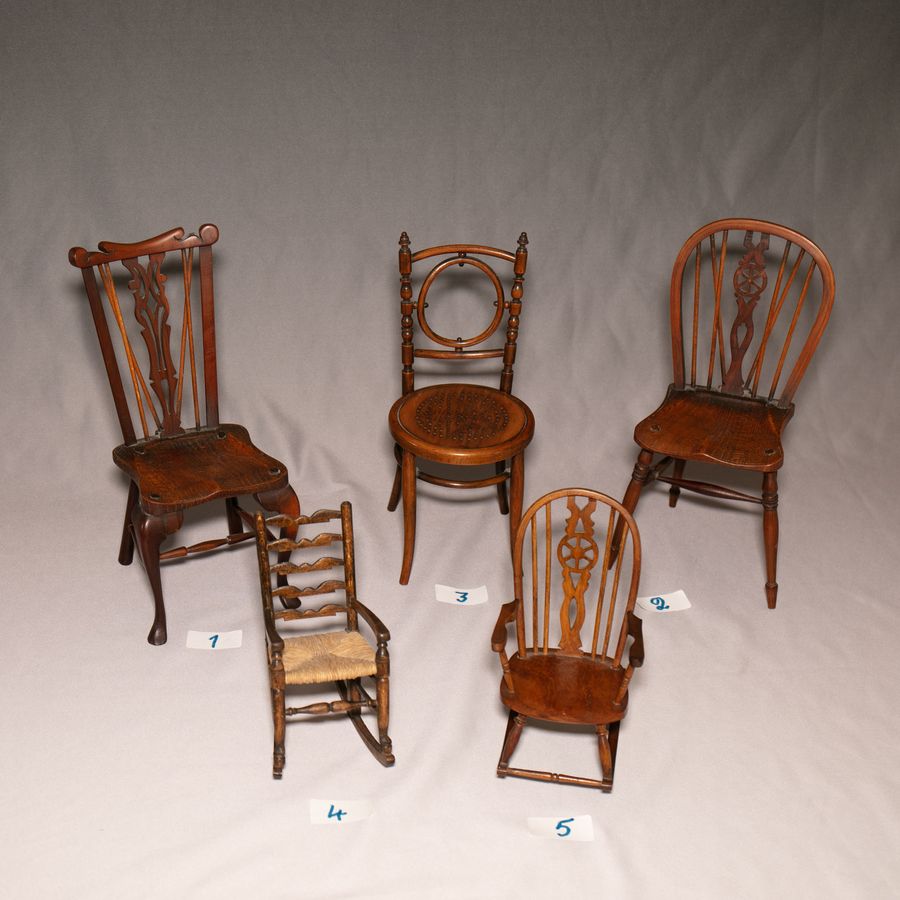 #10175 A Small collection of Five Miniature Chairs.