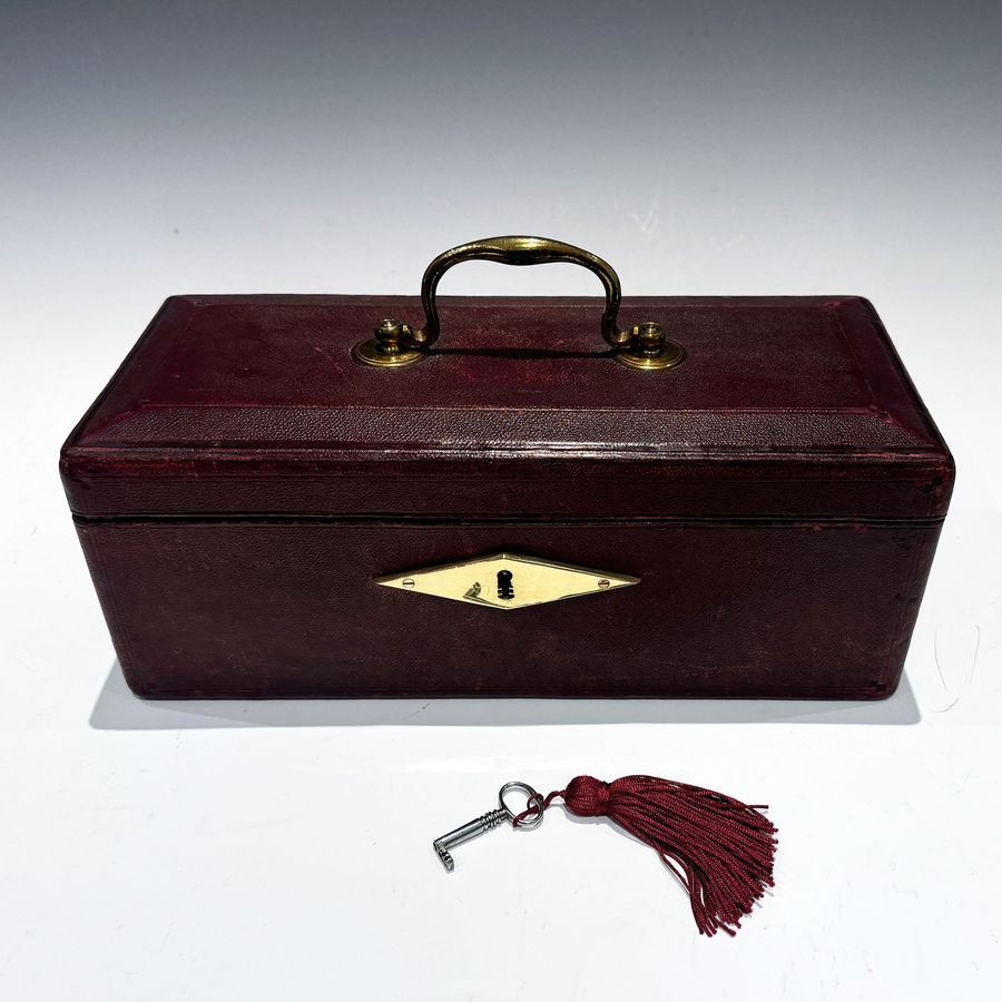 Antique #10214 A Small Georgian Burgundy Leather Despatch Box with Davis’s Patent Lock.