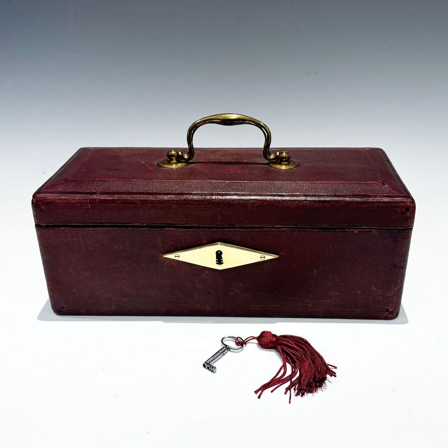 Antique #10214 A Small Georgian Burgundy Leather Despatch Box with Davis’s Patent Lock.