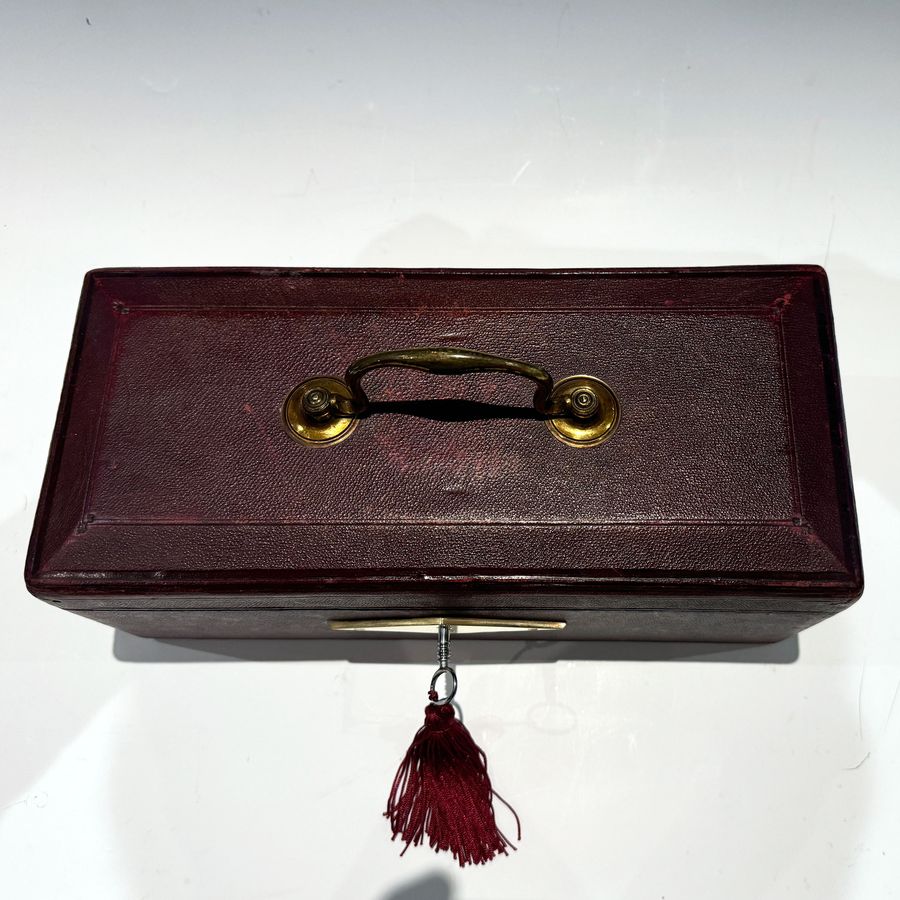 Antique #10214 A Small Georgian Burgundy Leather Despatch Box with Davis’s Patent Lock.