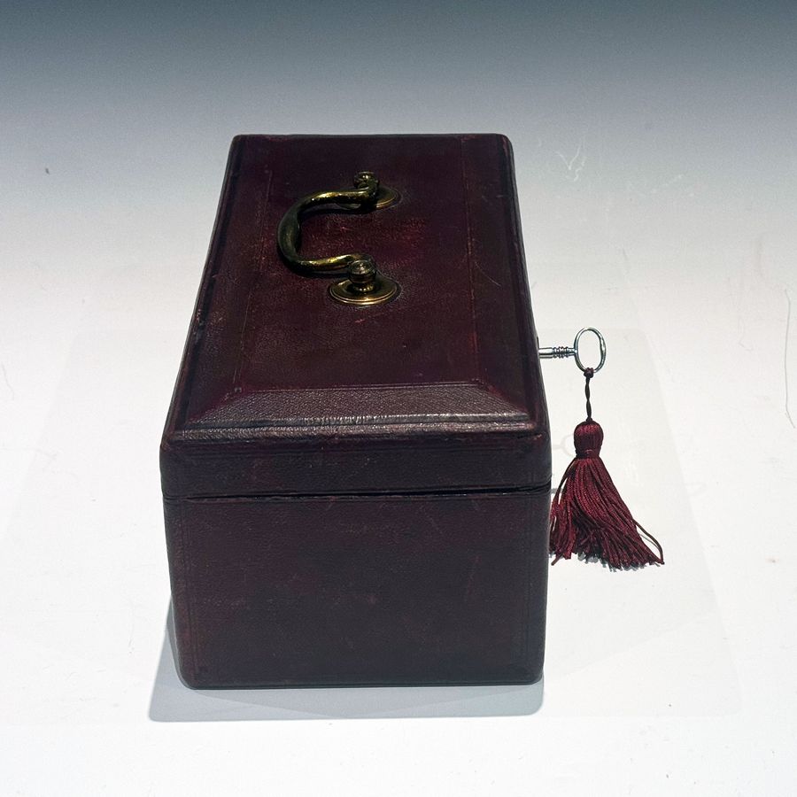 Antique #10214 A Small Georgian Burgundy Leather Despatch Box with Davis’s Patent Lock.