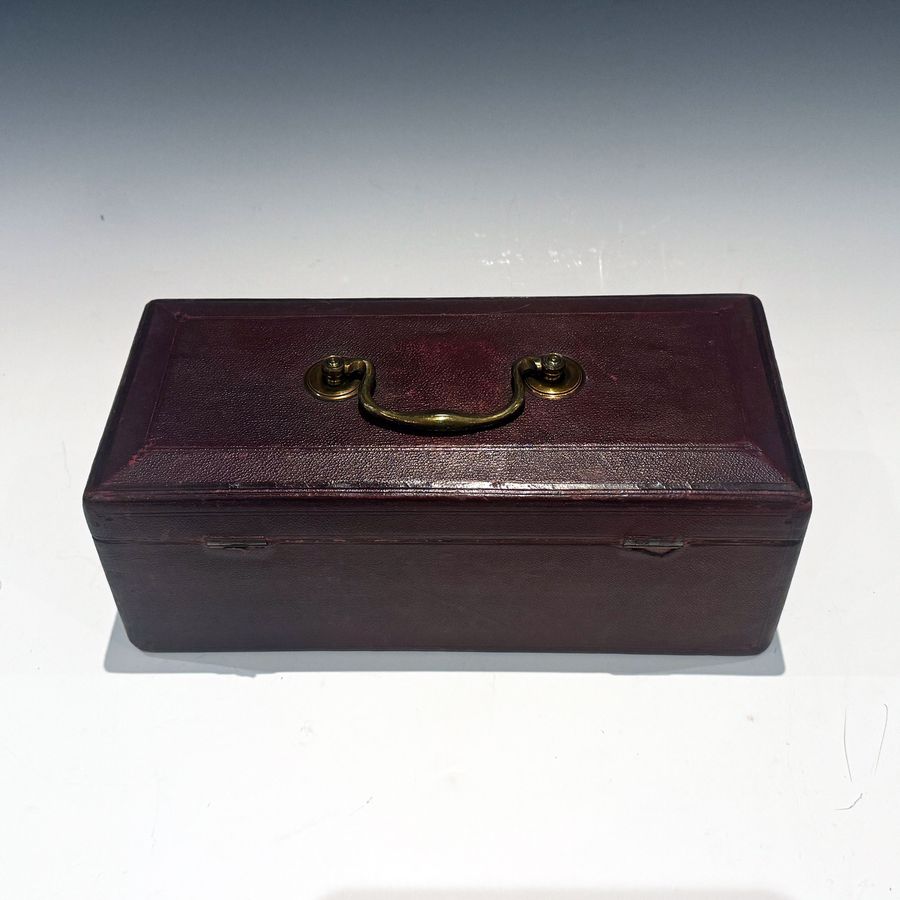 Antique #10214 A Small Georgian Burgundy Leather Despatch Box with Davis’s Patent Lock.