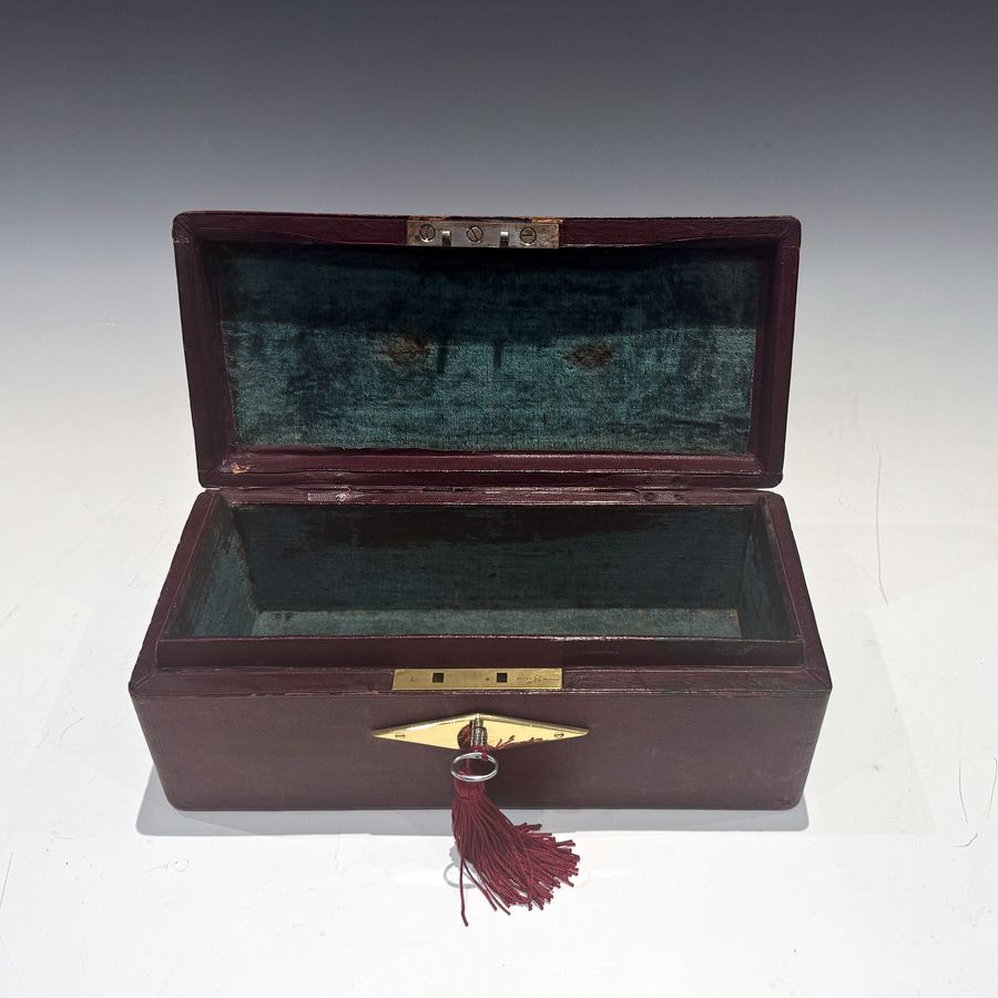 Antique #10214 A Small Georgian Burgundy Leather Despatch Box with Davis’s Patent Lock.