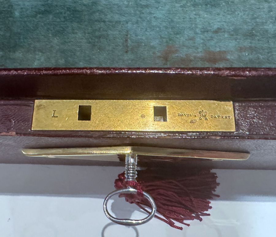 Antique #10214 A Small Georgian Burgundy Leather Despatch Box with Davis’s Patent Lock.