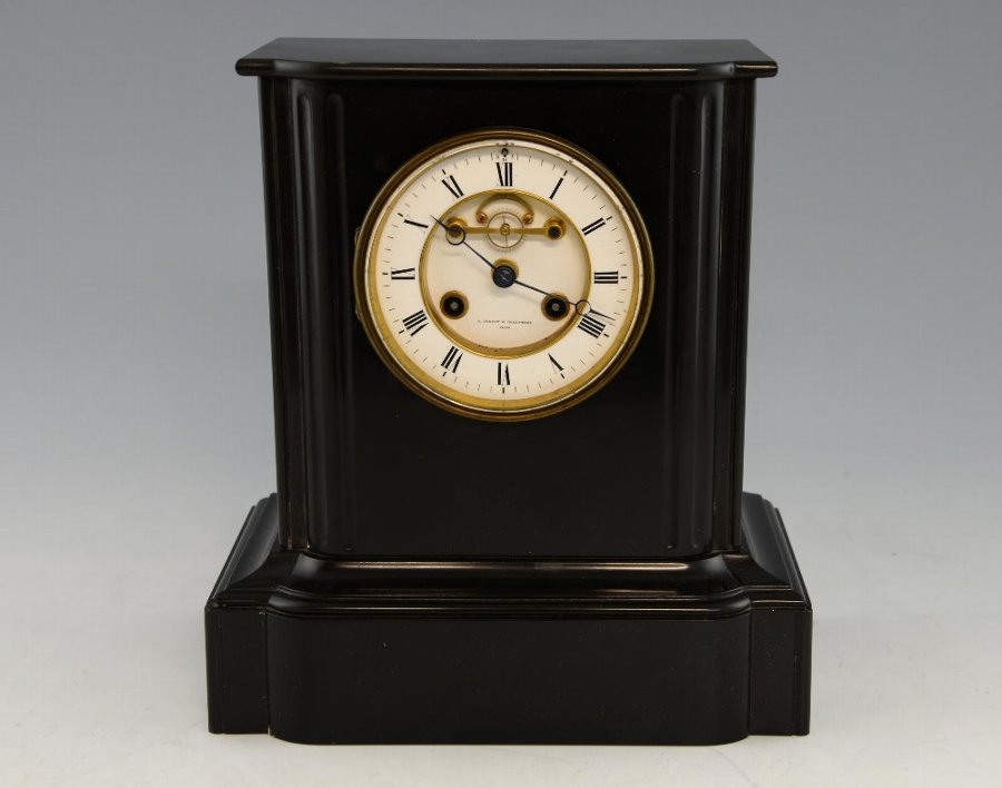 Antique French black marble mantel clock, with twin train movement
