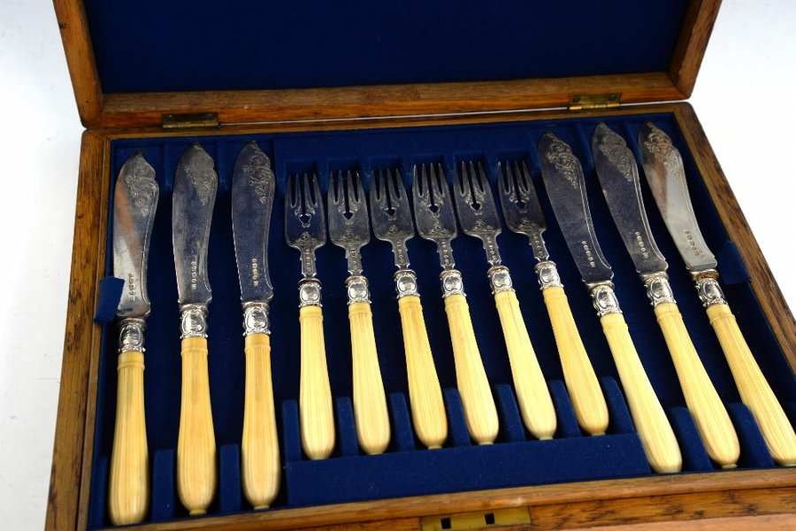 Antique Set of twelve Victorian silver and ivory handled fish knives and forks with engraved