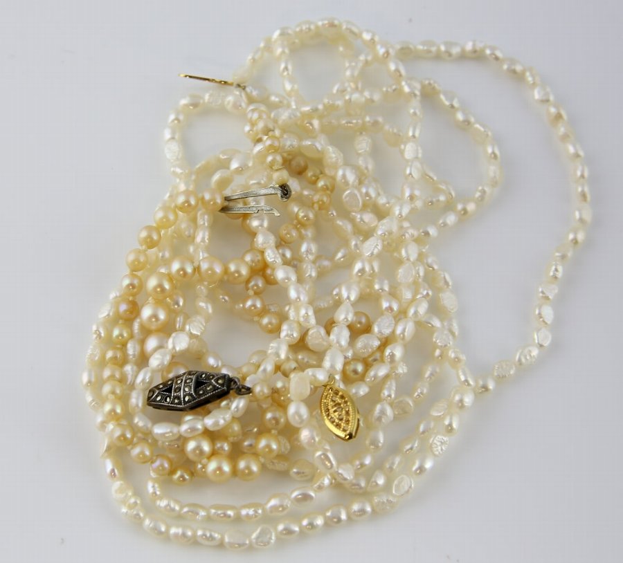 Antique Two pearl necklaces, graduated pearl necklace, with cream round ...