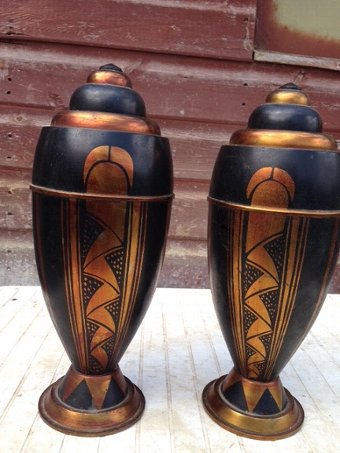 A pair of 32cm high by 13cm in diameter Art-deco bomb-shaped heavy brass vases, decorated in the ...