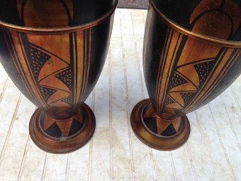 Antique A pair of 32cm high by 13cm in diameter Art-deco bomb-shaped heavy brass vases, decorated in the design and colours that simply define the style of Art-deco.