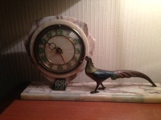 Antique Art-deco 40cm by 22cm by 9cm marble mantlepiece clock shield shaped face with Arabic numerals and cold painted small figure of a pheasant 
