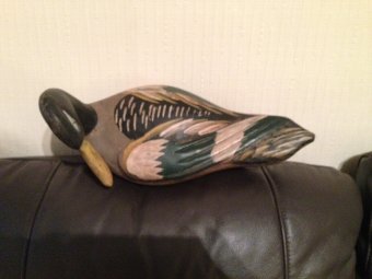 Antique A  20th century carved 33cm by 10cm wooden painted decoy duck in excellent condition.