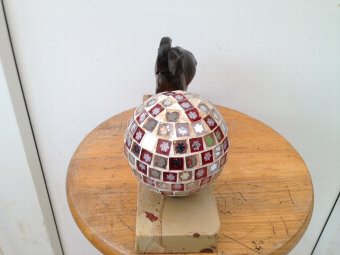 Antique Art-deco 25cm by 16cm by 5cm small side table lamp with an elephant standing on a marble base next to a multi-mirrored ball lamp shade 