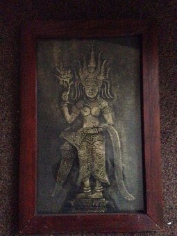Antique Very early Indian 28cm by 45cm artwork of a goddess portrayed in raise gold on aged black cloth. 