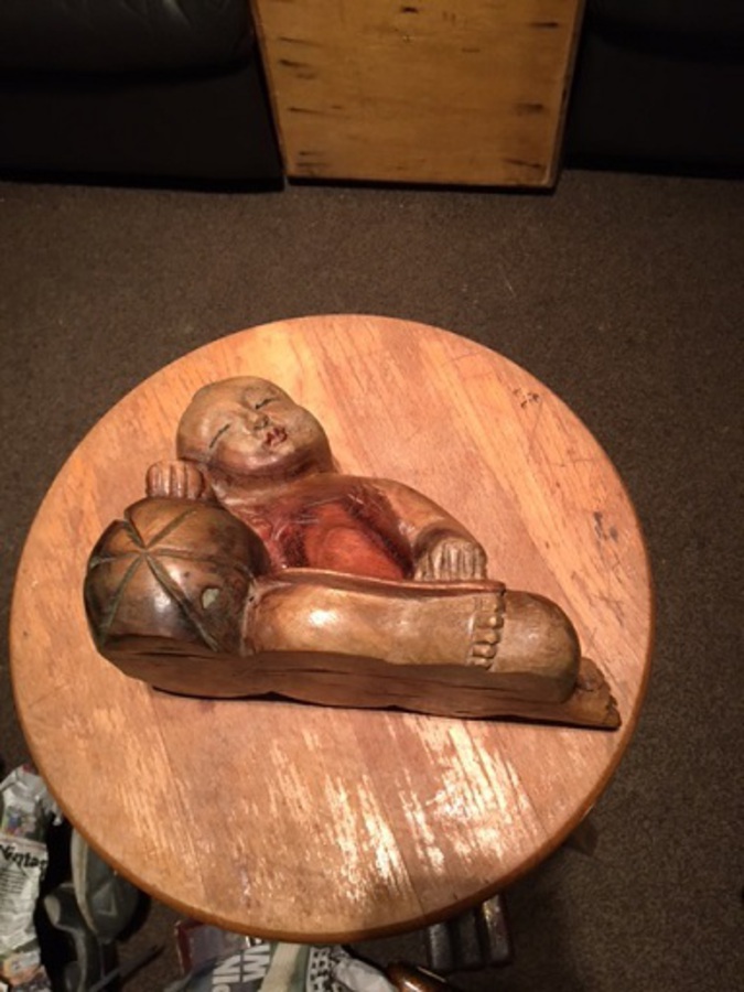 Antique This is an excellent early to mid-20th century hand carved in solid wood reclining Japanese boy