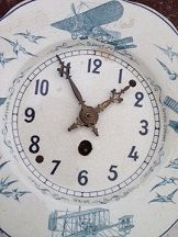 French 1920’s Jaz crackle finished ceramic faced wall clock, with transfer print decoration of na...