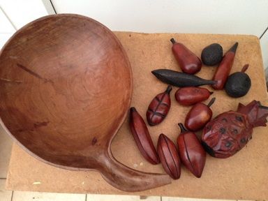 Antique Late 17th early 18th century possibly English 12 wooden hand-carved and stained shaped as pieces of fruit in various sizes in a 20th century carved leaf wooden bowl.