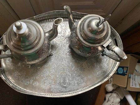 Antique  Early to mid-20th century Islamic white metal as (silver content unknown) ornately decorated oval tray with 2 tea pots.