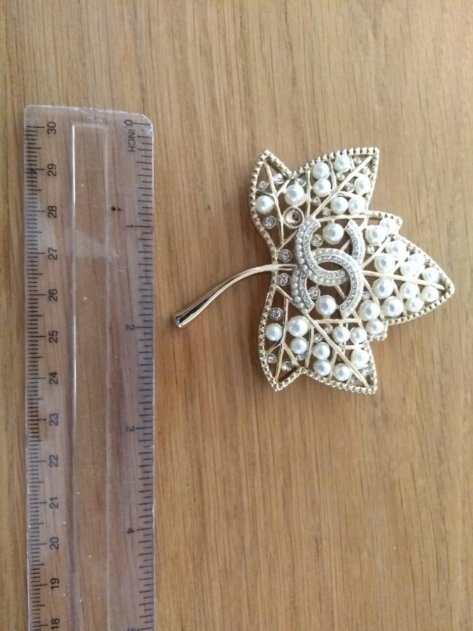 chanel leaf brooch