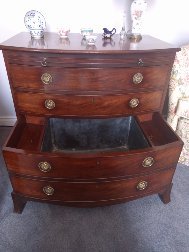 Antique George III mahogany bowfront chest incorporating lead-lined wine cooler. c.1810