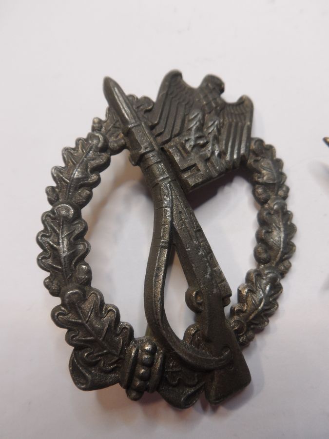 Antique Four WW2 German Badges with slight attention needed