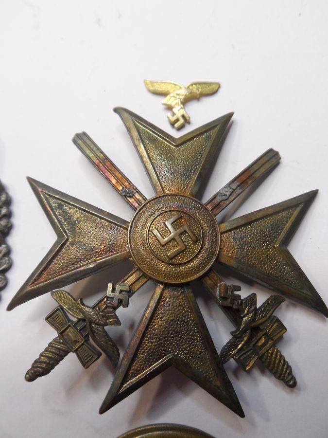 Antique Four WW2 German Badges with slight attention needed