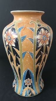 Antique An Art Nouveau style pottery vase.