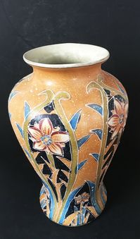 Antique An Art Nouveau style pottery vase.