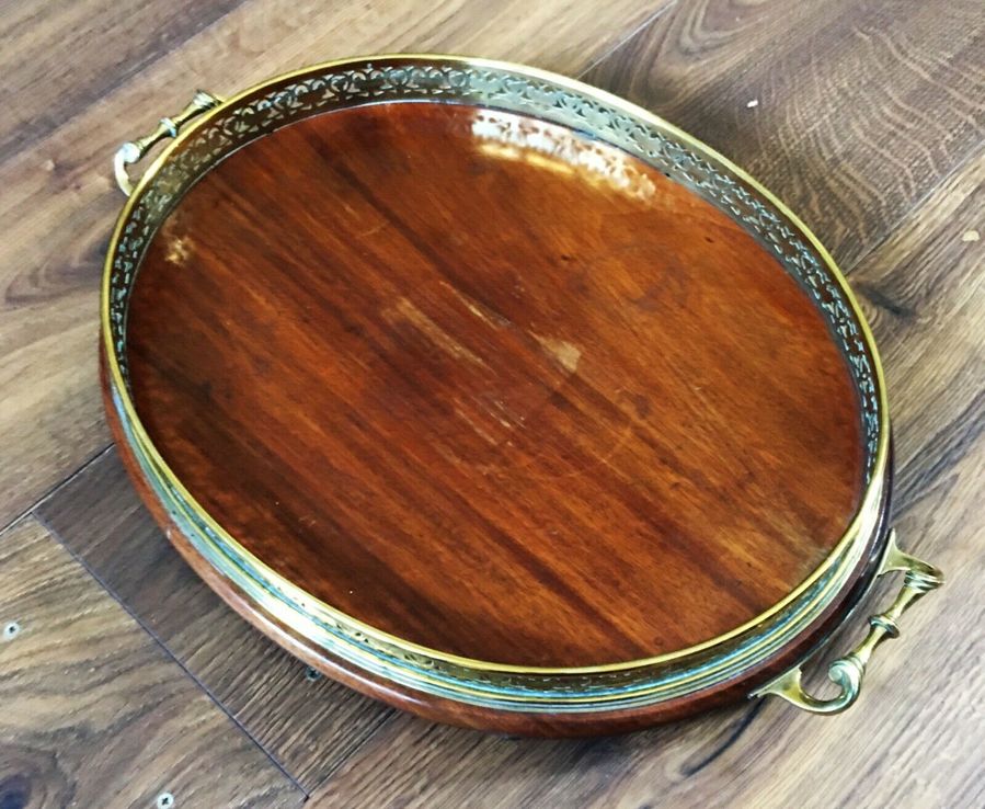 A late 19th/early 20th Century mahogany and brass galleried serving tray.