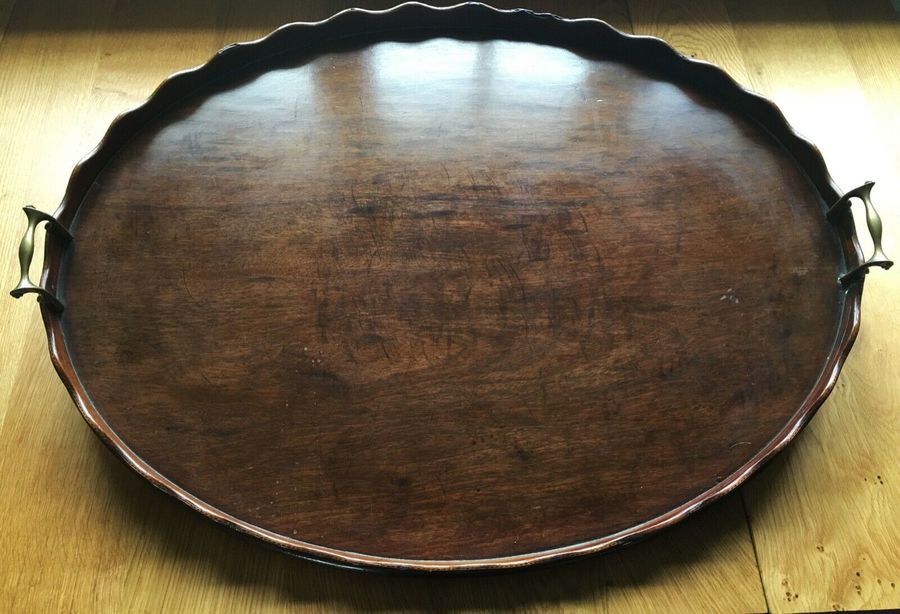 A large Edwardian mahogany galleried butlers tray.