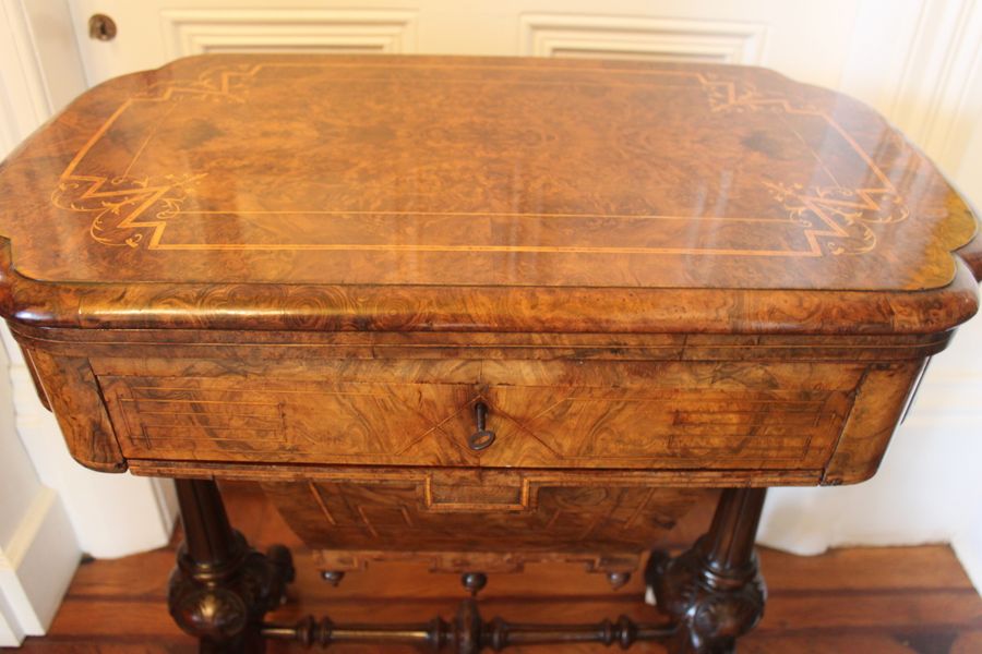 Antique A Victorian burr walnut games sewing table