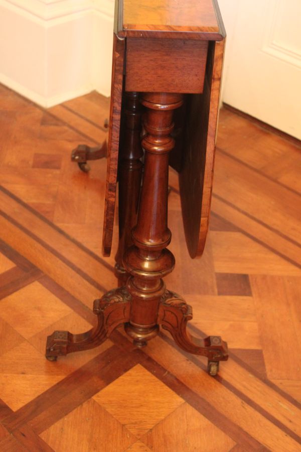 Antique A Victorian burr walnut and inlaid Sutherland table