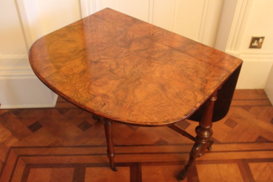 Antique A Victorian burr walnut and inlaid Sutherland table