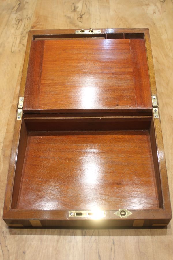 Antique A small Victorian walnut writing slope with secret drawers