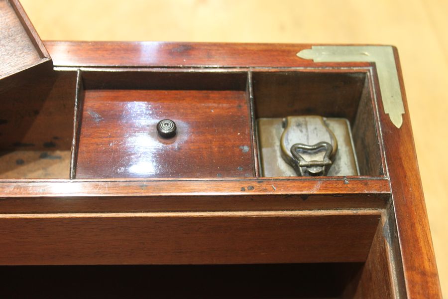 Antique Georgian mahogany and brass bound campaign writing slope. 