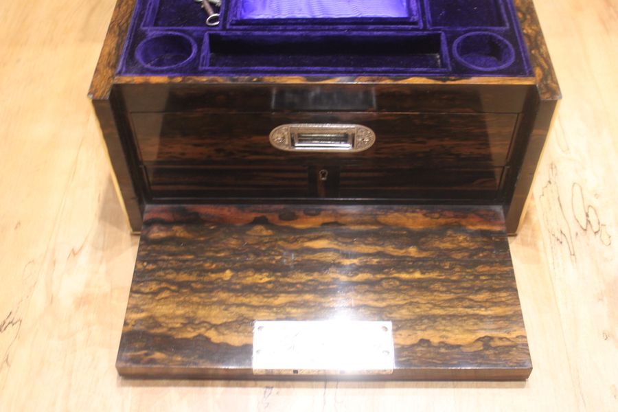 Antique A ladies Victorian Coromandel travelling dressing and jewellery box with a fitted interior.	