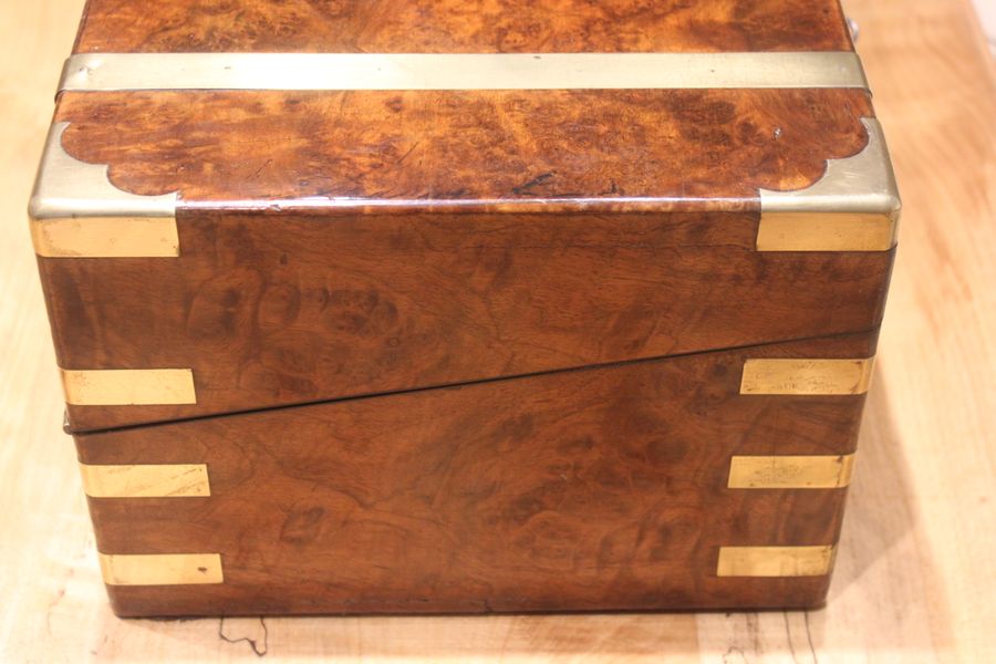 Antique A quality walnut writing slope with stationery compartments, secret drawers etc.