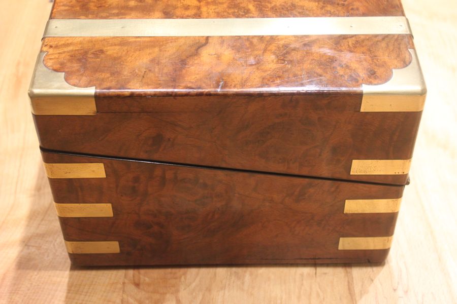 Antique A quality walnut writing slope with stationery compartments, secret drawers etc.