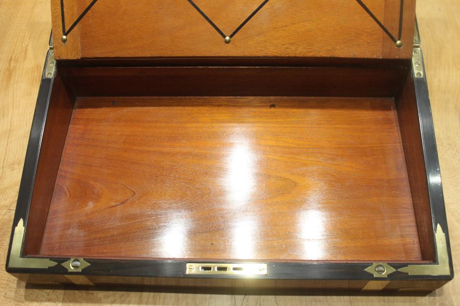 Antique A quality walnut writing slope with stationery compartments, secret drawers etc.