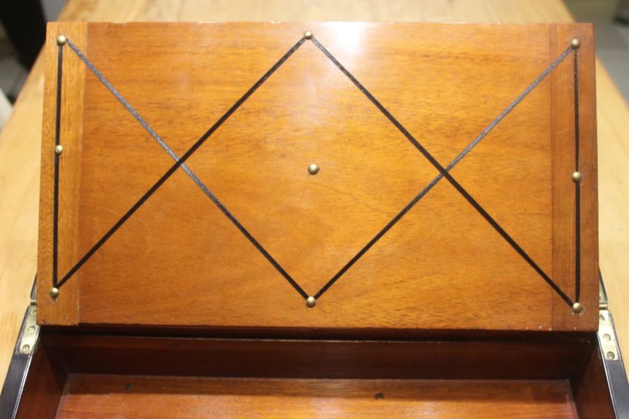 Antique A quality walnut writing slope with stationery compartments, secret drawers etc.