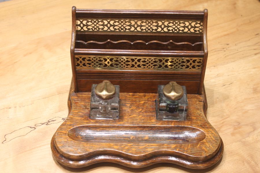 Late Victorian oak and brass desk tidy or standish