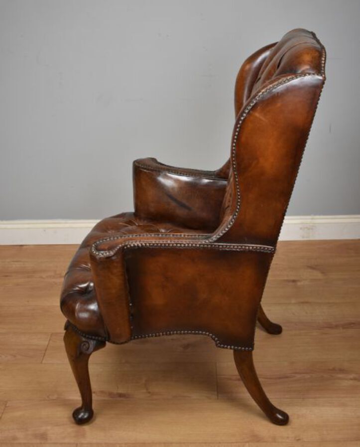 Antique 20th Century Hand Dyed Distressed Tan Leather Wingback Armchair