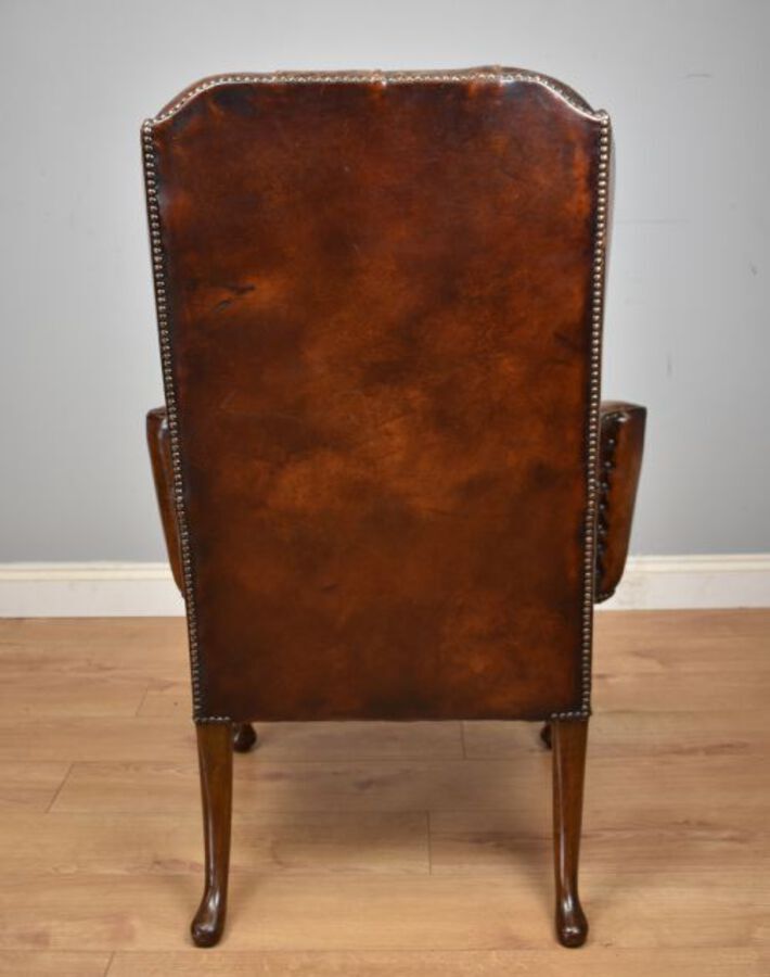 Antique 20th Century Hand Dyed Distressed Tan Leather Wingback Armchair