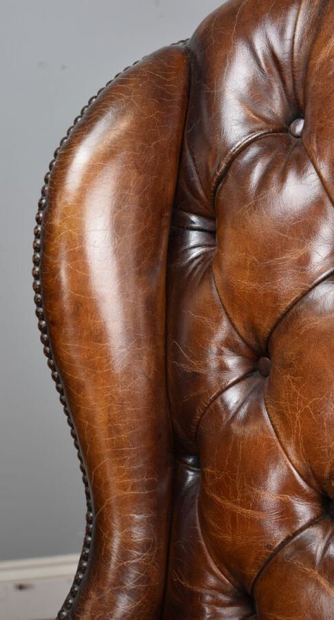 Antique 20th Century Hand Dyed Distressed Tan Leather Wingback Armchair