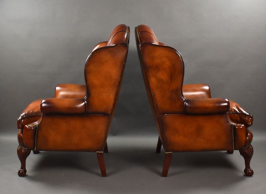Antique Pair of Leather Wing Chairs