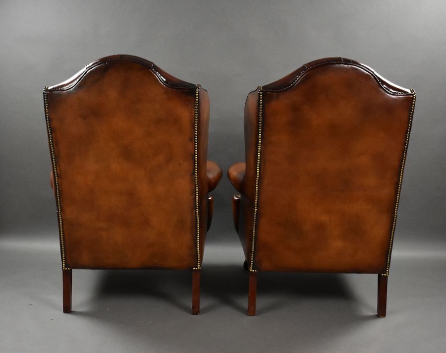 Antique Pair of Leather Wing Chairs