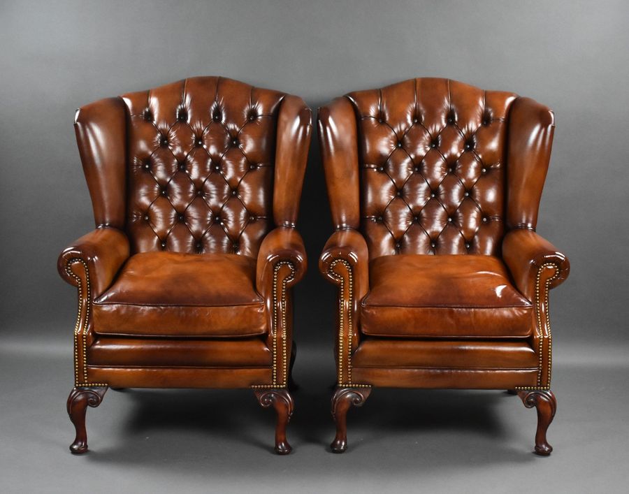 Antique Pair of Leather Wing Back Armchairs