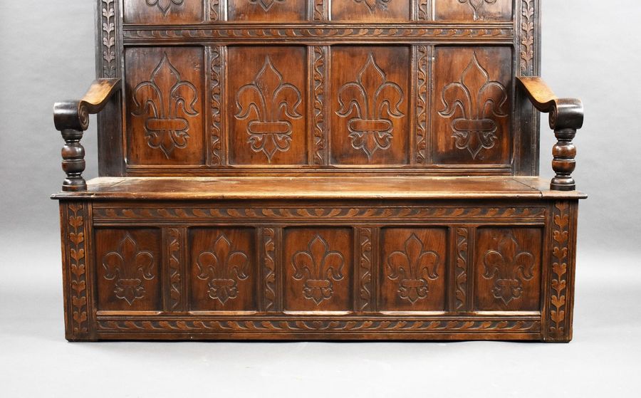 Antique 18th Century and later Carved Oak high back settle/bench