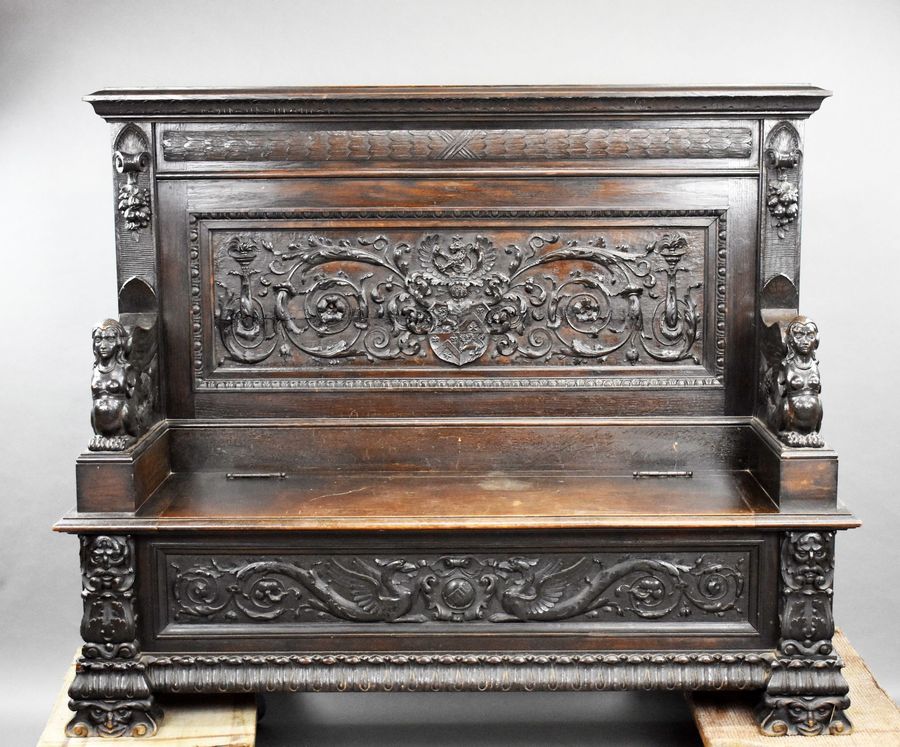 19th Century Heavil Carved Oak Settle