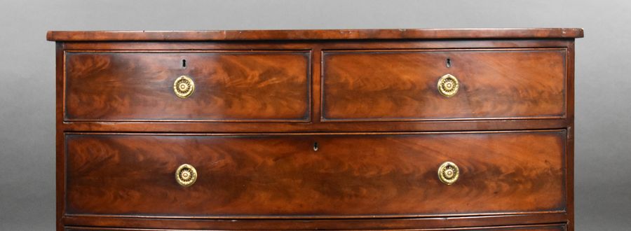 Antique Regency Flame Mahogany Bow Front Chest