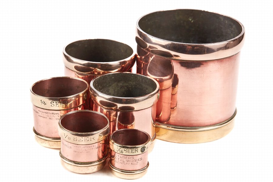 Unusual Set of Six Graduated Copper & Brass Vessels